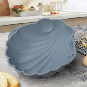 Grand moule à gâteau en silicone coquillage pour la pâtisserie, flexible et antiadhésif.