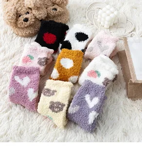 Detailed view of cozy thick coral fleece women winter warm sleep socks with cute patterns.