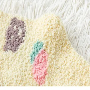 Soft thick coral fleece winter warm floor socks detail view, cozy and fluffy texture for home.