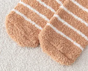 Cozy coral fleece striped winter socks, soft thickened fuzzy home sleeping socks for women.