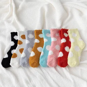 Cozy coral fleece fuzzy socks for women winter thick warm sleep polka dot socks set flat lay