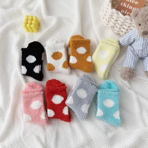Women winter fluffy coral fleece sleep socks, thick warm cozy polka dot mid-tube snow socks.