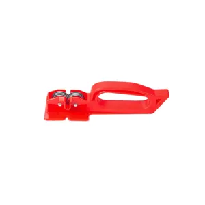 Red handheld kitchen knife sharpener tool with ergonomic handle and dual sharpening slots.