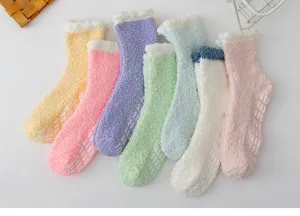 Cozy winter coral fleece fuzzy socks with anti-slip grips, thick warm mid-tube hosiery for home.