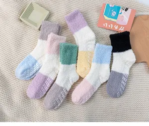 Cozy color block fuzzy coral fleece socks detail view, soft thick thermal home sleep socks.