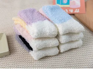 Cozy winter thick coral fleece socks with color block design, warm and soft for home wear.