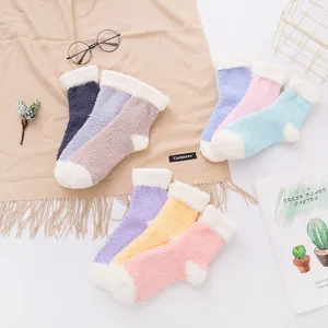 Warm winter coral fleece fuzzy socks for women, thick cozy sleep socks with cute contrast color.