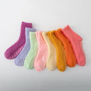 Cozy winter coral fleece fuzzy socks with anti-slip grip soles, thick warm sleep socks.