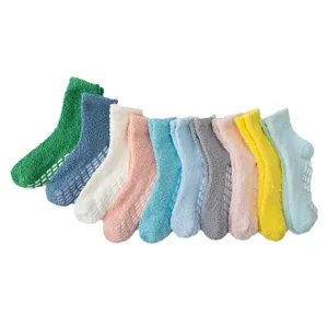Winter thick coral fleece socks with anti-slip grip soles, cozy fuzzy home sleep socks.