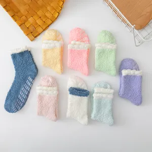 Thickened coral fleece fuzzy socks with anti-slip grips, winter warm mid-tube home sleep socks.