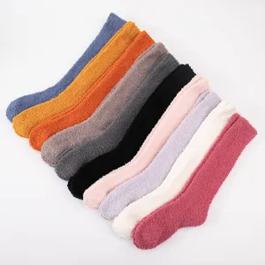 Winter thick coral fleece sleep socks for women, warm fuzzy long calf socks cozy home wear.
