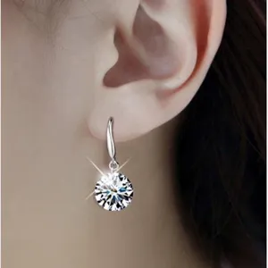 Elegant single-stone zircon drop earrings featuring a minimalist teardrop hook design.