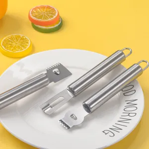 Juego de herramientas de cocina de acero inoxidable para rallar limones y pelar agrumos facilmente.