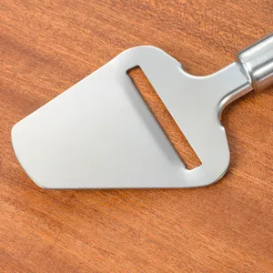 Stainless steel cheese slicer detail view, professional kitchen tool for cheese and butter.