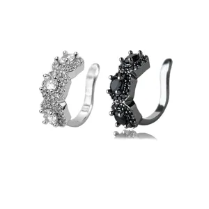 Non-piercing ear cuff set featuring sparkling zircon stones in silver and black metal.