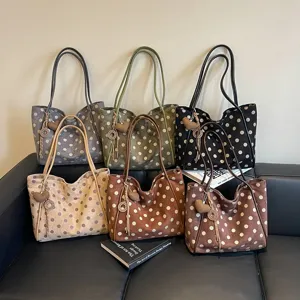 Polka dot tote bag detail view, slouchy large capacity shoulder bag for women daily commute.