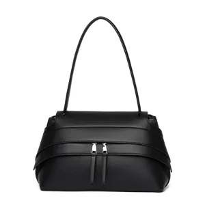 Classic black leather shoulder bag for women, stylish underarm handbag with chic zipper detail.