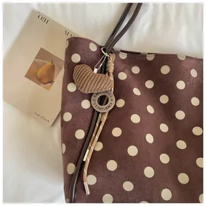Brown polka dot tote bag with cute heart pendant, casual large capacity shoulder bag for women.