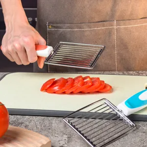 Stainless steel tomato slicer kitchen tool with anti-slip handle for fruit and meat.