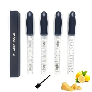 Stainless steel kitchen grater set with 4 blades, black handle, cheese and lemon tool.
