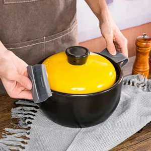 Silicone pot handle covers detail view, heat resistant anti-scald grips for kitchen cookware.
