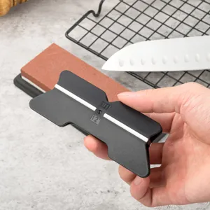 Fixed angle knife sharpening guide clamp for kitchen knife sharpener with ceramic rods.