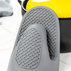 Gray silicone pinch mitt detail showing textured anti-slip grip surface for kitchen baking.