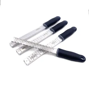 Stainless steel lemon and cheese zester grater with ergonomic handle, 4-piece kitchen tool set.