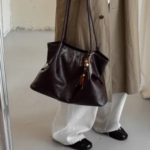 Dark brown vintage large capacity tote bag detail, casual minimalist shoulder bag for women.