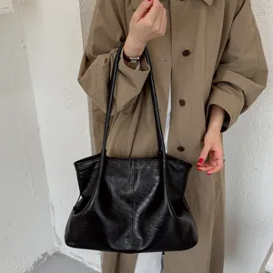Black PU leather vintage large capacity tote shoulder bag detail view, casual commute style.
