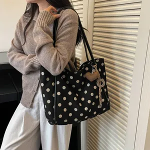 Black and white polka dot canvas tote bag, large capacity stylish shoulder bag for women.