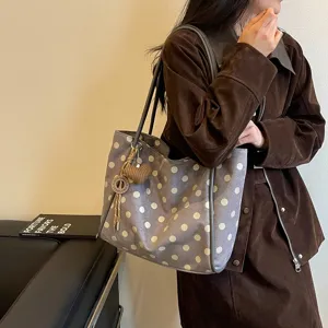 Casual chic polka dot tote bag, stylish shoulder bag for women daily commute use.