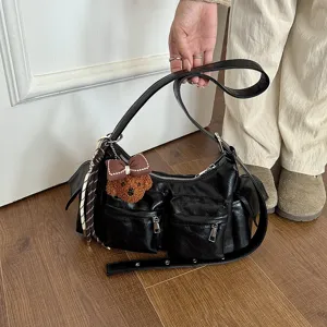 Black multi-pocket shoulder bag for women, versatile PU leather casual crossbody handbag.
