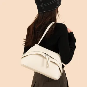 Stylish women's minimalist shoulder bag PU leather underarm handbag for daily casual wear.