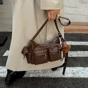 Brown multi-pocket commuter shoulder bag, stylish casual crossbody bag for women daily use.