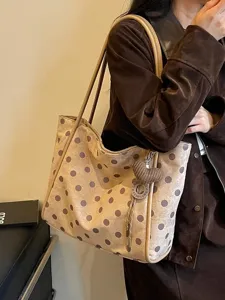 Chic brown polka dot tote bag for women, stylish large capacity shoulder bag for daily commute.