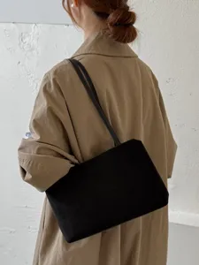 Minimalist black retro single shoulder underarm bag casual commuting tote bag for women main view.