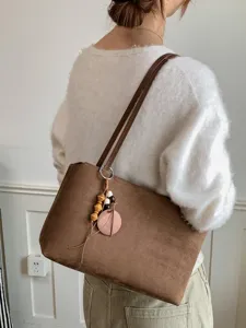 Retro suede shoulder bag for women, large capacity commuting tote bag, autumn winter fashion.