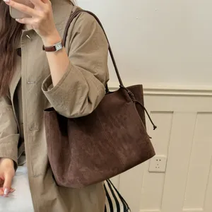 Vintage brown suede tote bag for women, large capacity shoulder bag for daily commute.