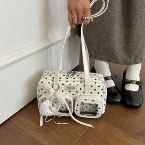 White polka dot bowling handbag with transparent pockets, stylish casual shoulder bag.