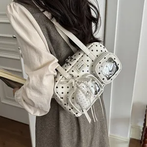 Chic polka dot bowling shoulder bag for women, large capacity stylish daily commuting purse.