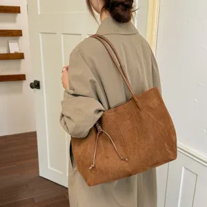 Brown suede shoulder tote bag, large capacity commuter bag for women, vintage style daily use.