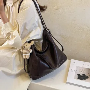 Stylish large capacity brown shoulder bag for women, soft leather casual tote bag.