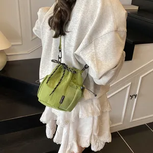 Japanese ins style niche design drawstring nylon bucket bag outdoor casual fashion crossbody bag