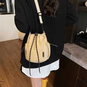 Japanese style nylon crossbody bucket bag casual drawstring shoulder bag for everyday use