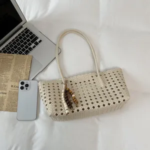Large capacity hollow woven tote bag, stylish summer commuter single shoulder bag.