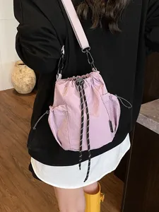 Japanese Ins style nylon drawstring bucket bag, casual crossbody bag for outdoor sports.