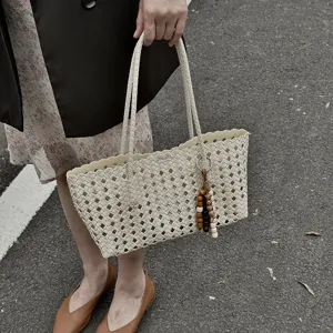 Chic hollow woven tote bag for women, large capacity summer casual shoulder bag.