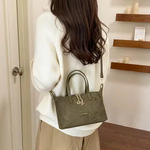 Minimalist suede handbag for women, vintage olive green solid color crossbody bag, chic design.