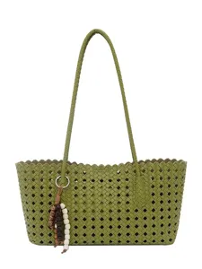 Large capacity green woven tote bag for women, stylish hollow summer shoulder bag commute.